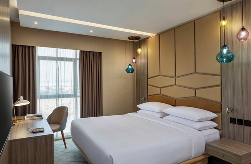 Dubai Production City Hotel | 1BR Suite | FourPoints Dubai | Extra Space, Pool + Spa, Dubai Base