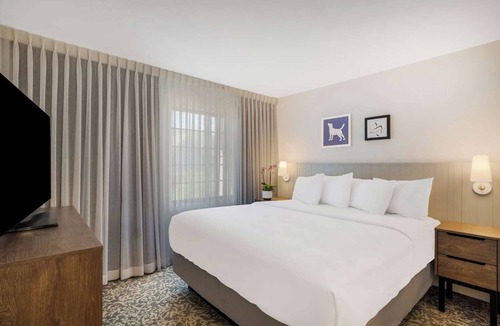Acres Green Hotel | 3 Family Ready Suites with Living Space Near Park Meadows | Outdoor Pool