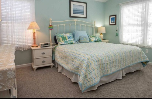 Gold Coast Condo | Adorable four bedroom 2 1/2 bath second floor condo with rooftop deck
