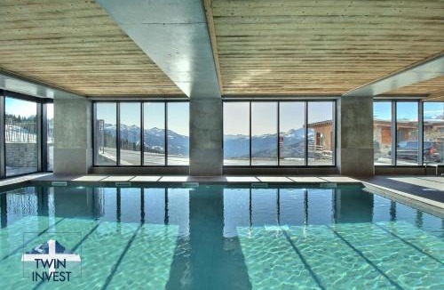 Arc-1600 Apartment | ARC 1600, LE RIDGE, Appartement 07 personnes Vue Montagne - ski aux pieds - Sauna, Hammam, Piscine, Salle de salle de sport-fitness