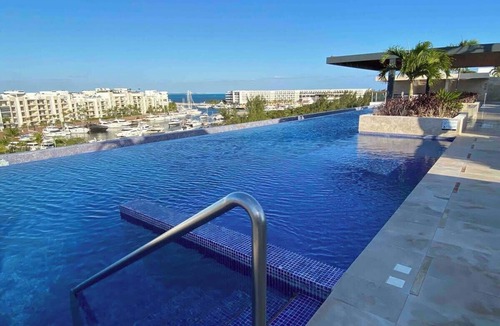 Playa Mujeres Apartment | Beach Front Luxury 4 BDRM Heated Pool WiFi
