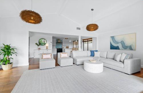 Broadbeach Waters House | Canal Sanctuary - Waterside Living with Pool & Jetty