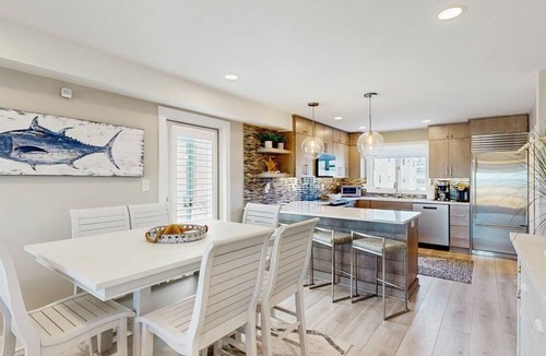 North Ocean City House | Luxurious oceanfront townhome with private deck and panoramic coastal views
