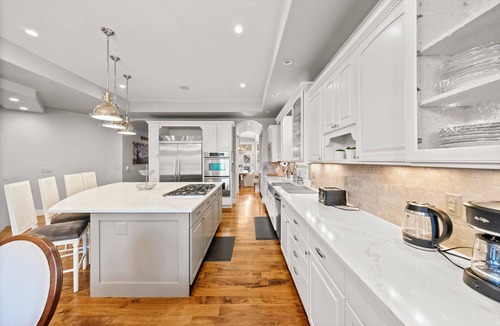 University Park House | Maison Monroe. Entertainment basement/theater/gym