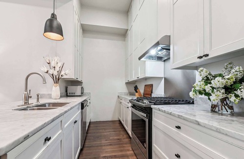 Central Business District Hotel | Mega 4 Condo Suite Near French Quarter | 8BR 8BA