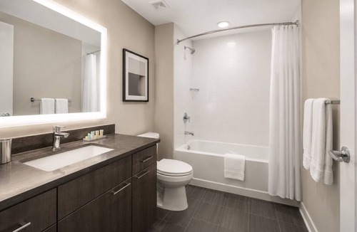 Wellington Place Hotel | Sunny Studio Downtown Stay Near Theaters & Transit