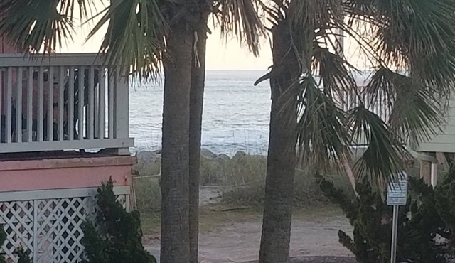 Beach access across street! Partial ocean view. 1 BR + futon with linens. 1.5 BA
