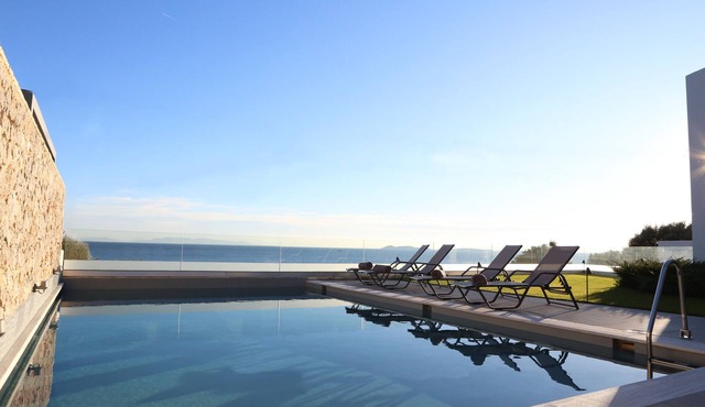Beach front villa with private sea water pool & amazing sea view to Saronic golf
