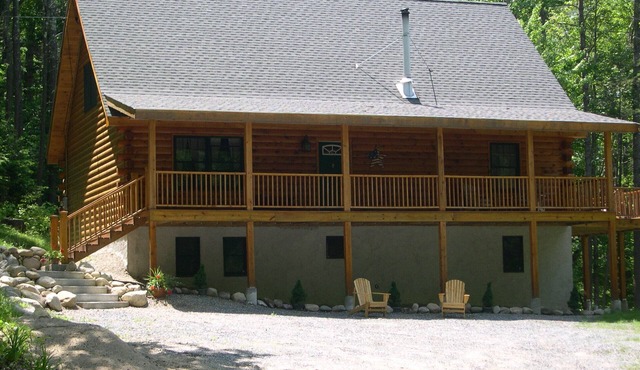 Charming log home, spacious yet cozy, nestled in the White Mountain region.
