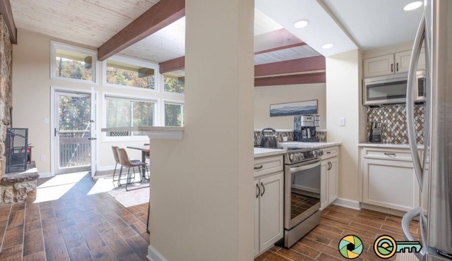 Double the Condo, Double the Fun! | Ski slope side & Mountain views | Vaulted ceilings!