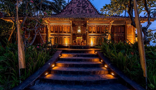 Exquisite beachfront joglo in lush coconut grove