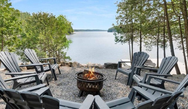 Private 235 ft waterfront retreat with over an acre on Lake Rosseau