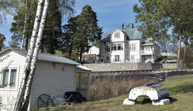 Semi-detached villa with lake plot, jetty & rowing boat