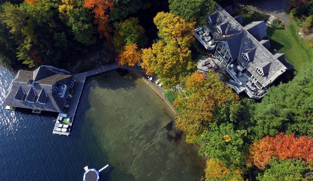 Stunning 6 brdm, 7 bath cottage on Lake Joe! Sand Beach! Boathouse! Has it All!